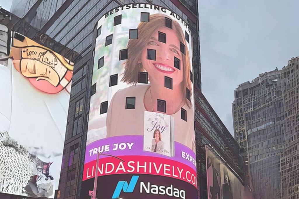 Linda Shively featured in New York City Time Square Nasdaq Jumbotron